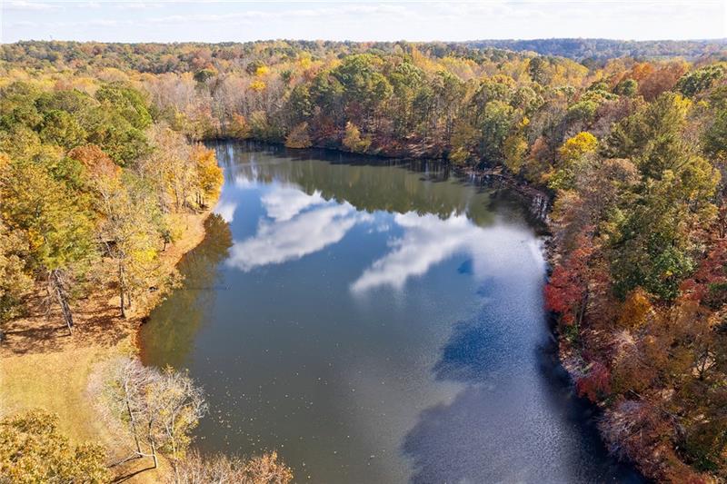 1801 Birmingham Road Milton, GA 30004 - Photo 100 of 102 a view of a lake with a mountain in the background