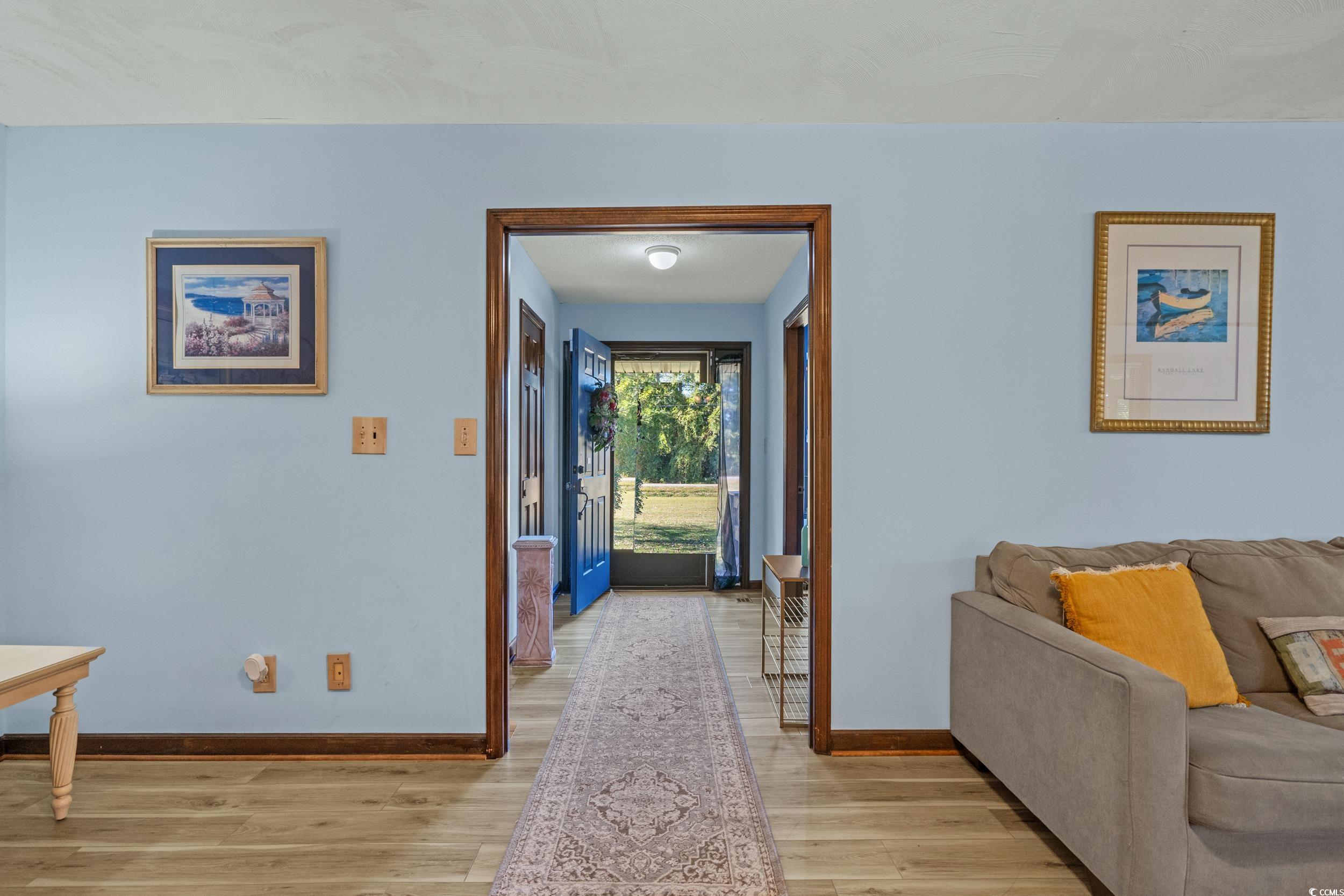 1063 Burcale Road Myrtle Beach, SC 29579 - Photo 9 of 36 Foyer entrance with light wood finished floors and baseboards