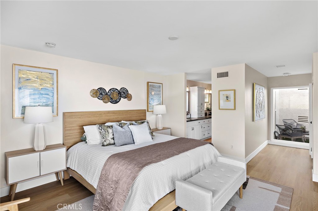 3326 Paseo Halcon San Clemente, CA 92672 - Photo 16 of 28 a bedroom with a large bed and a night stand