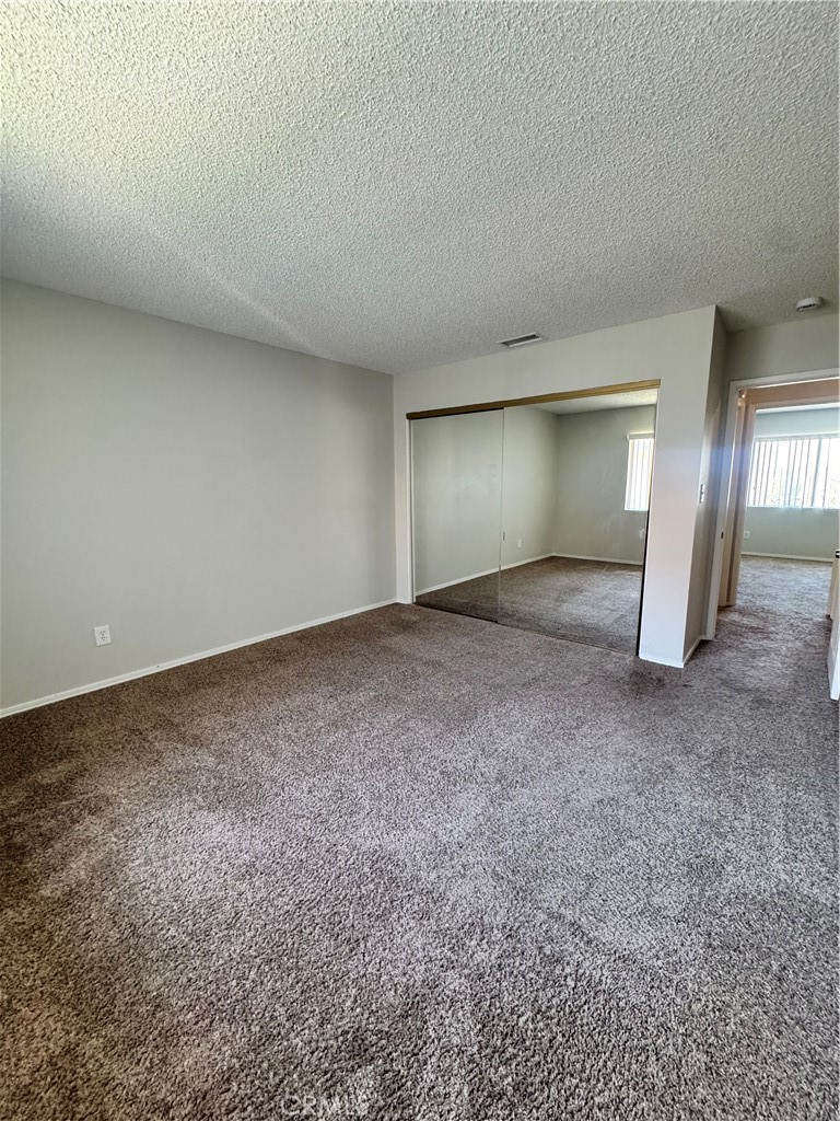 2255 Cahuilla Street, Unit 140 Colton, CA 92324 - Photo 7 of 9 a view of empty room