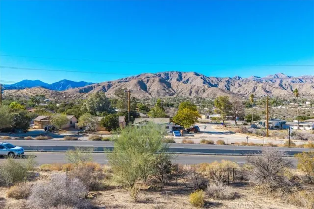 a view of mountain view with mountains in the background