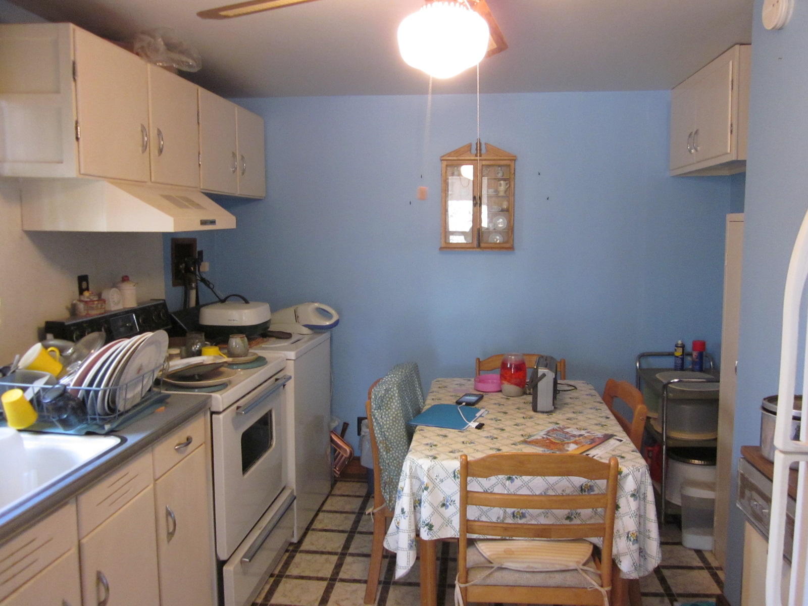 1928 Swelling Road Ferrum, VA 24088 - Photo 12 of 18 a kitchen with a sink stove and cabinets
