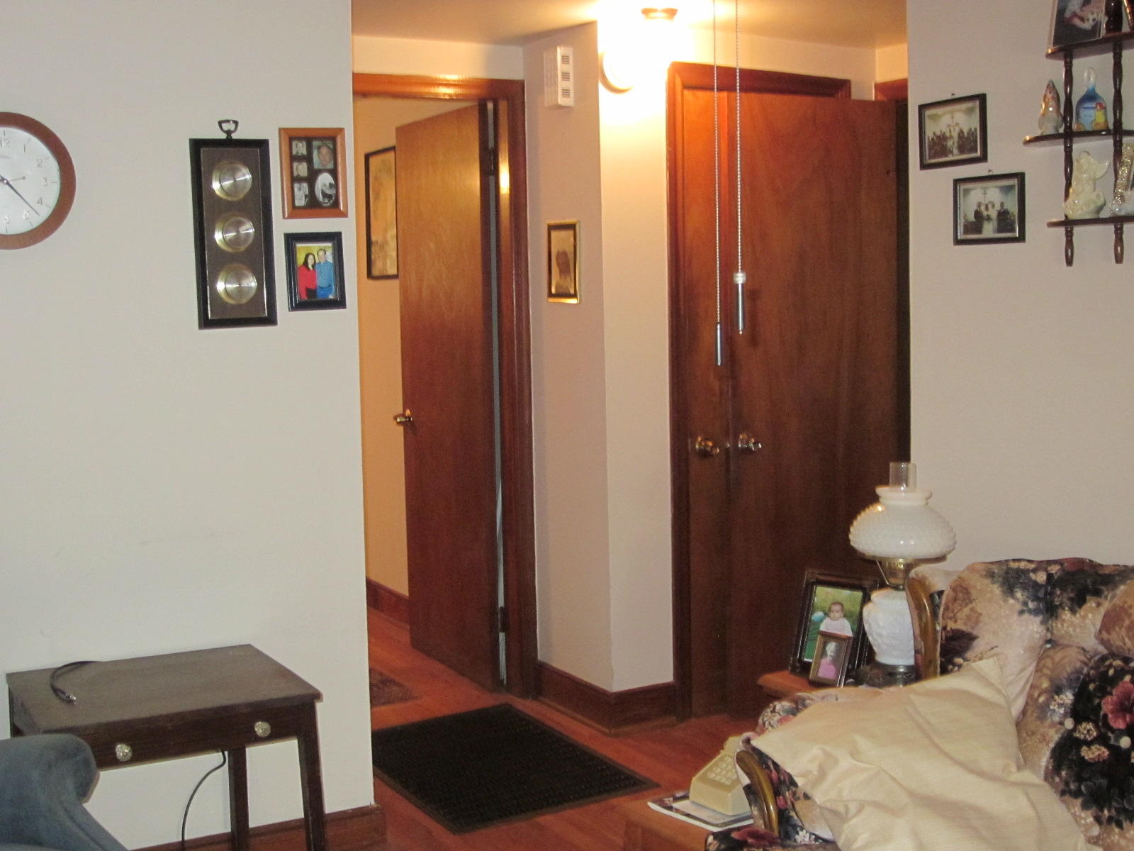 1928 Swelling Road Ferrum, VA 24088 - Photo 16 of 18 a bedroom with a bed and a chair with the wooden floor