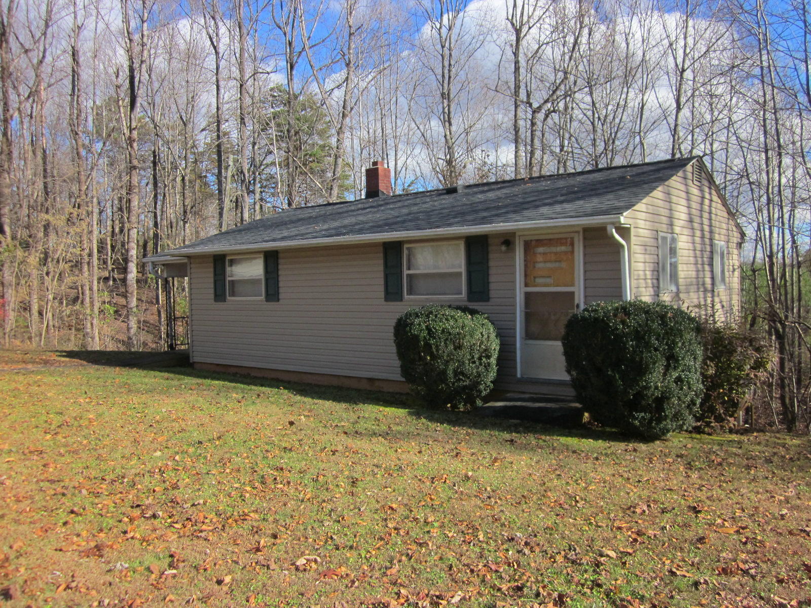 1928 Swelling Road Ferrum, VA 24088 - Photo 3 of 18 a view of a house with backyard and garden