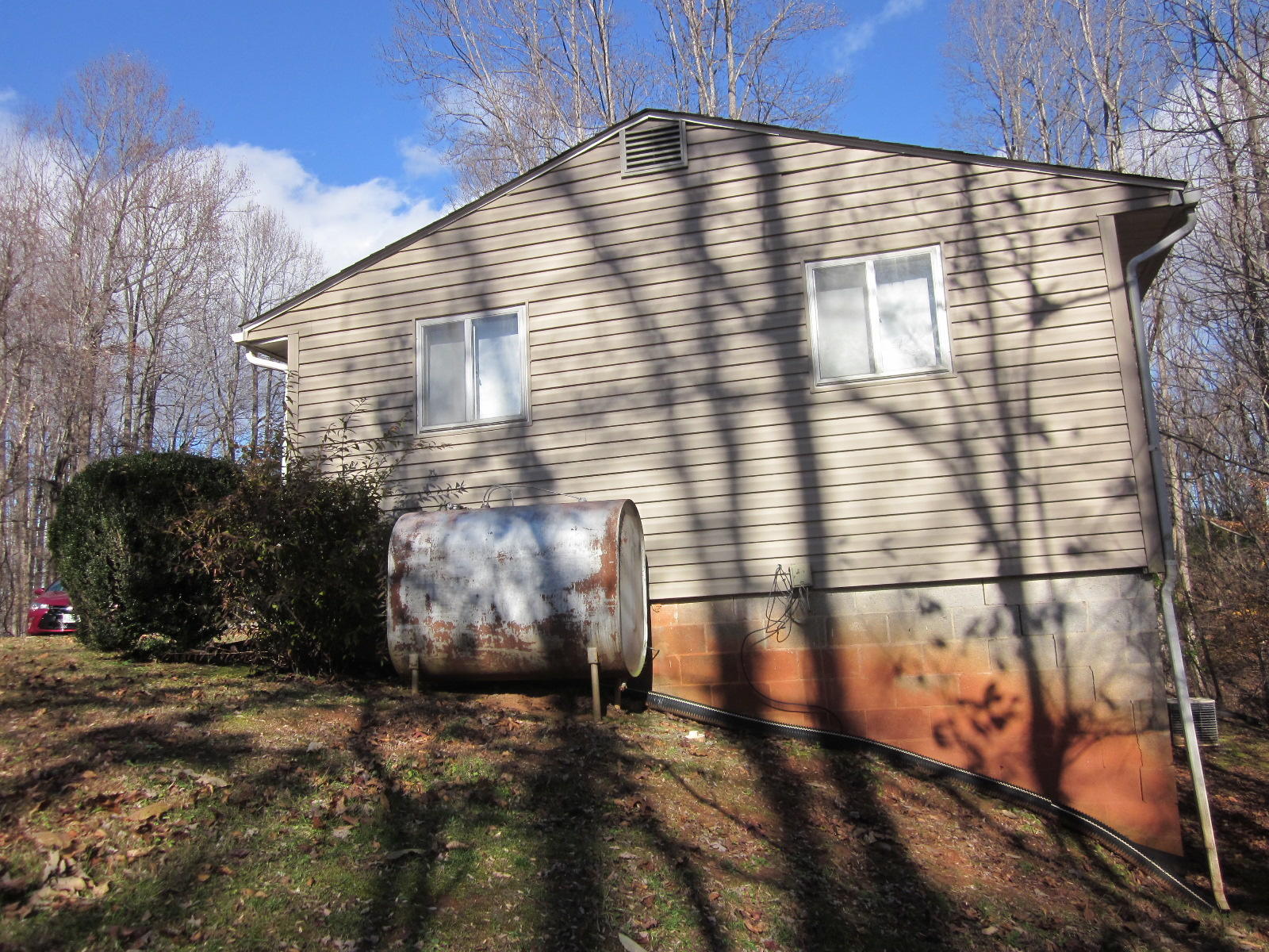 1928 Swelling Road Ferrum, VA 24088 - Photo 6 of 18 a view of a back yard of the house