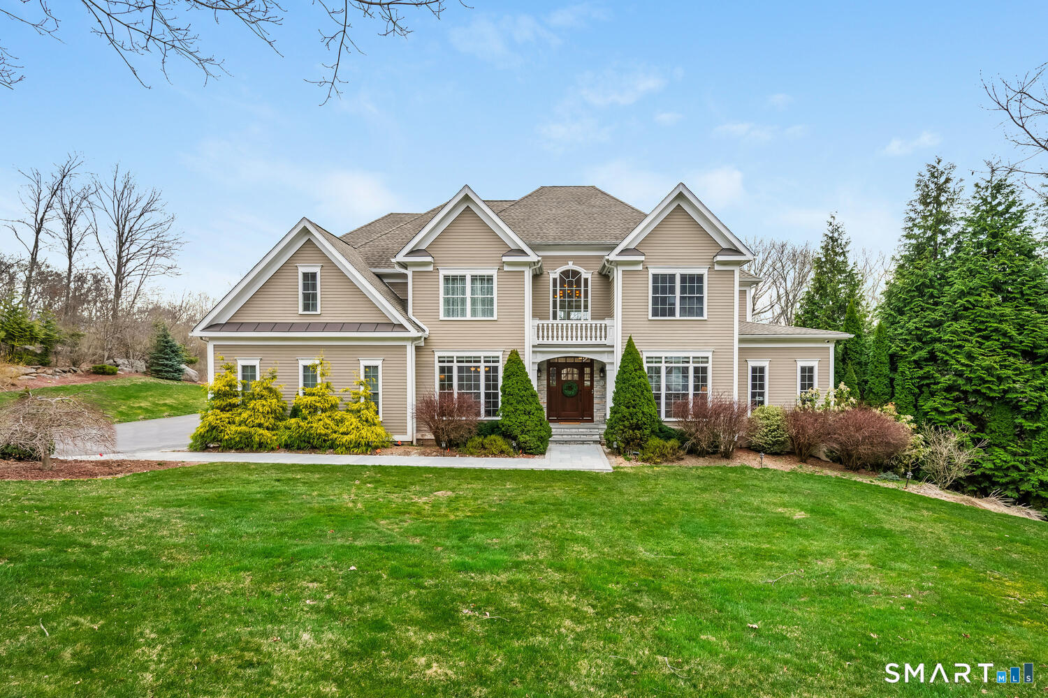 95 Pinto Lane Monroe, CT 06468 - Photo 1 of 40 a front view of a house with a yard and garage
