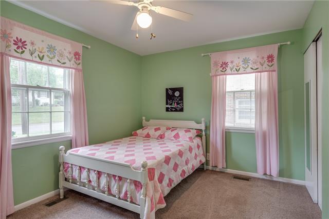 72 Benzing Road Antioch, TN 37013 - Photo 16 of 20 a bedroom with a bed and a window