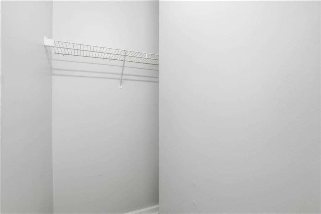 5855 Crescent Ridge Court Lithonia, GA 30058 - Photo 31 of 46 a close up view of racks on the wall