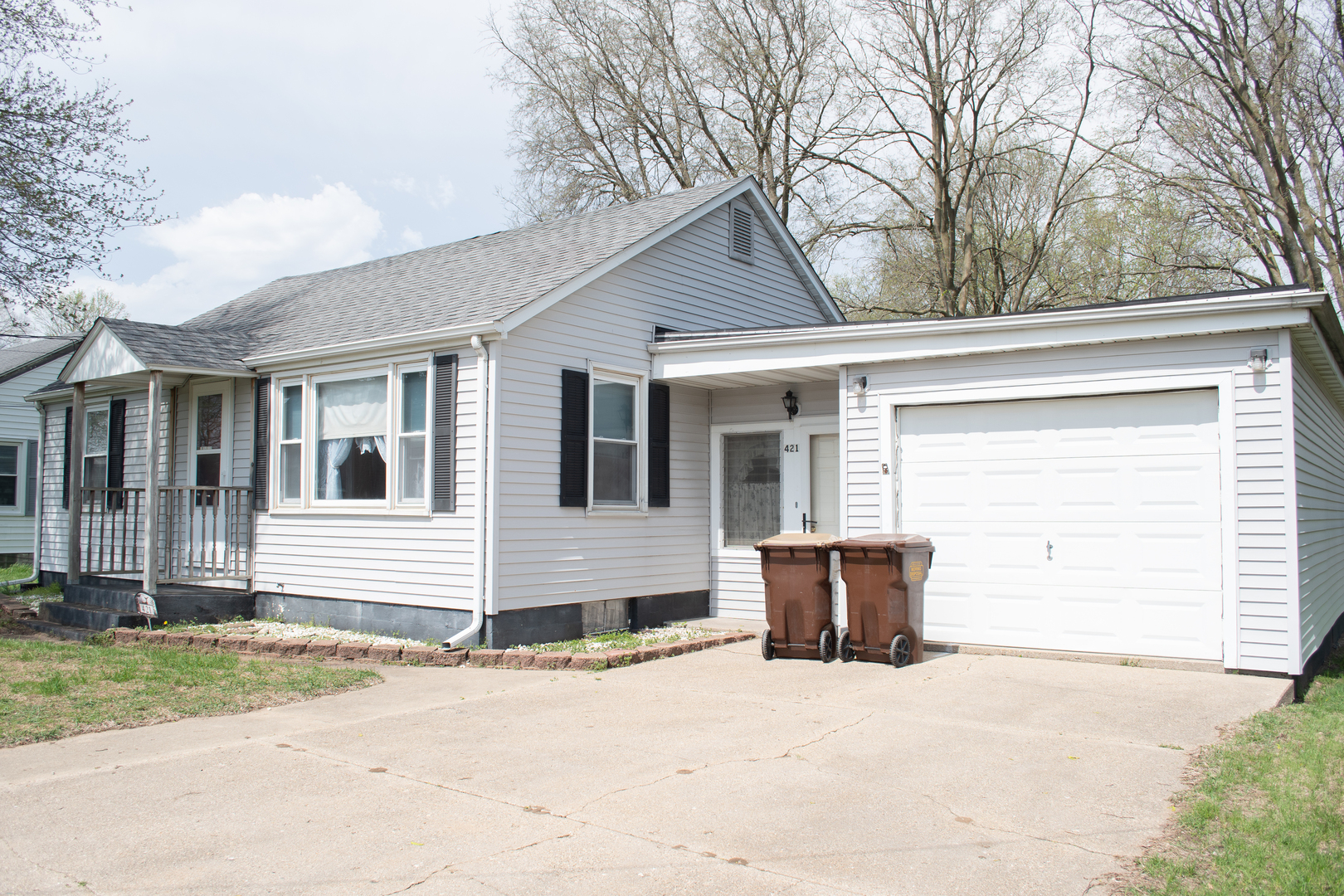 a front view of a house with patio