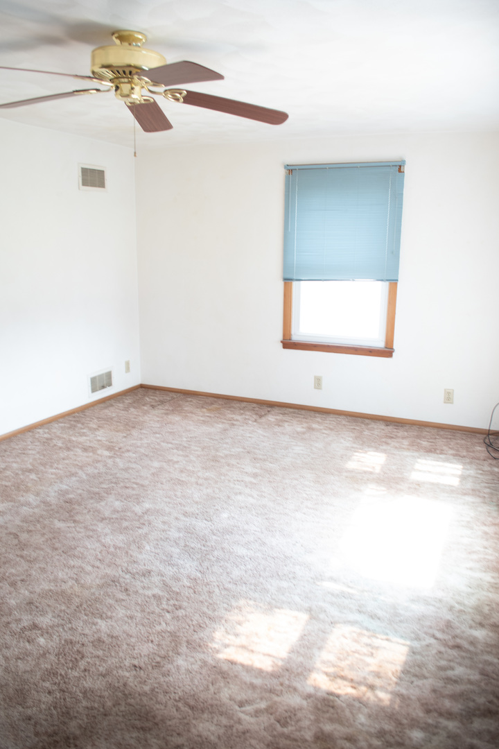 421 7th Avenue Erie, IL 61250 - Photo 13 of 27 a view of an empty room with a window