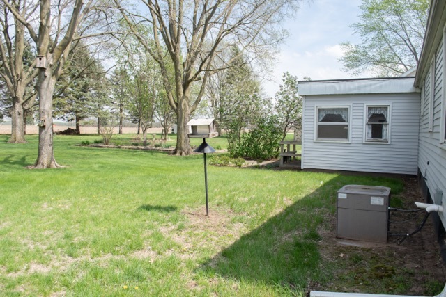 421 7th Avenue Erie, IL 61250 - Photo 7 of 27 a view of a house with a backyard