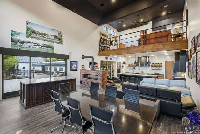 a kitchen with stainless steel appliances granite countertop a stove and refrigerator