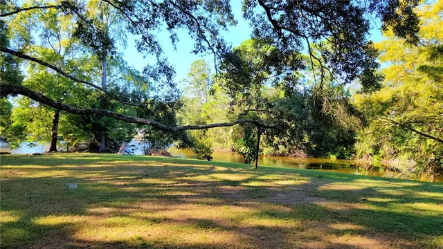 a view of a building with a big yard