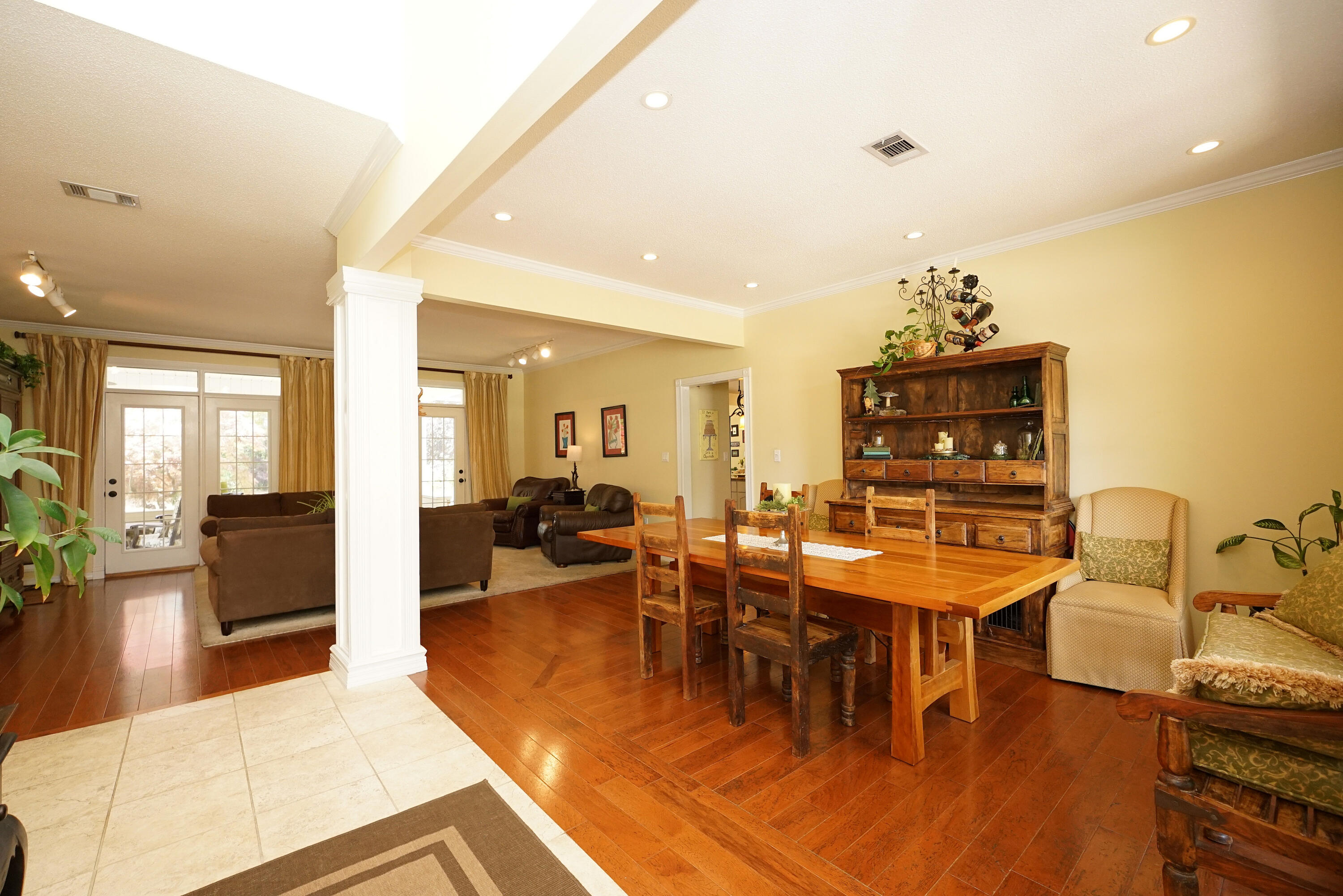 941 Ruckel Drive Niceville, FL 32578 - Photo 12 of 57 a view of a dining room with furniture window and wooden floor