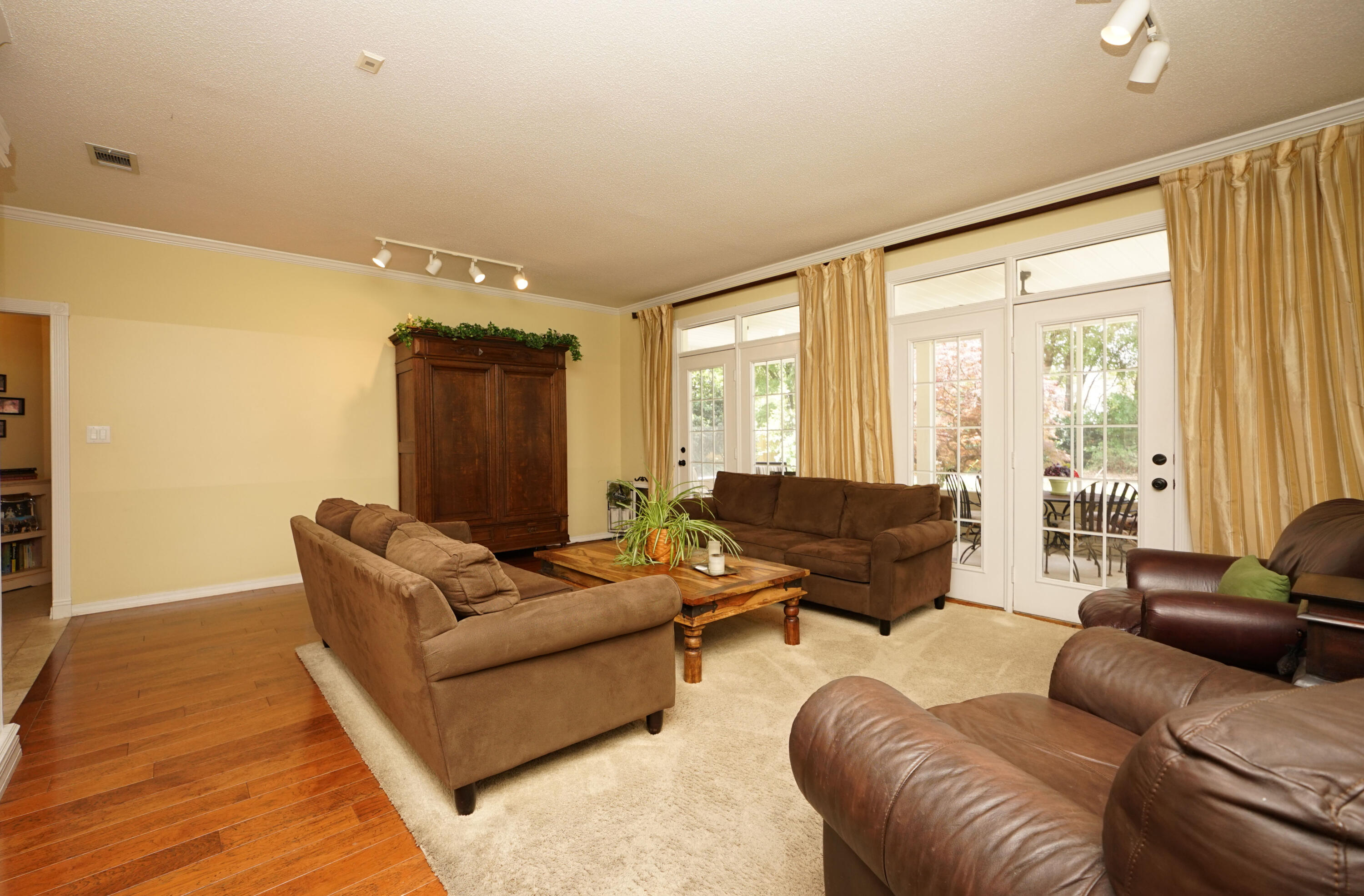 941 Ruckel Drive Niceville, FL 32578 - Photo 17 of 57 a living room with furniture and a large window