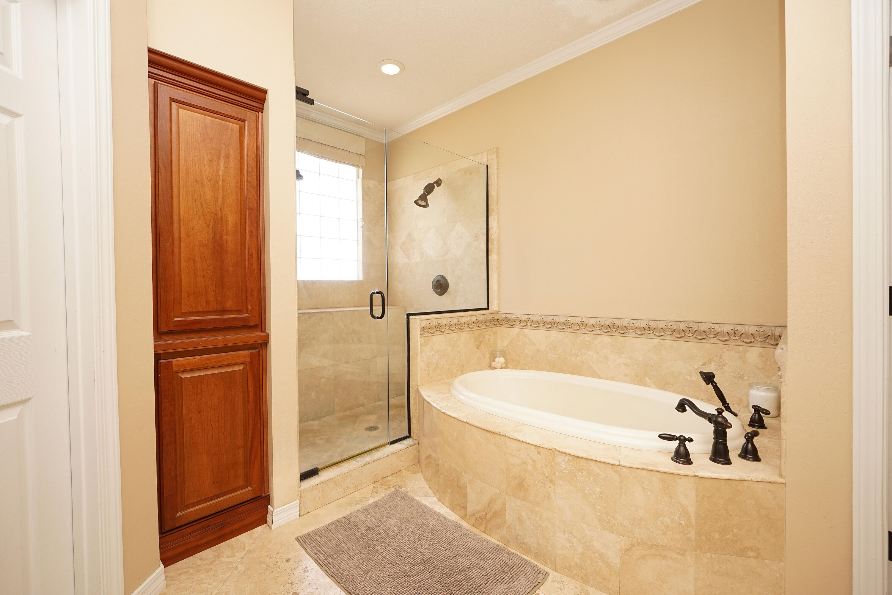941 Ruckel Drive Niceville, FL 32578 - Photo 36 of 57 a bathroom with a bathtub and a shower