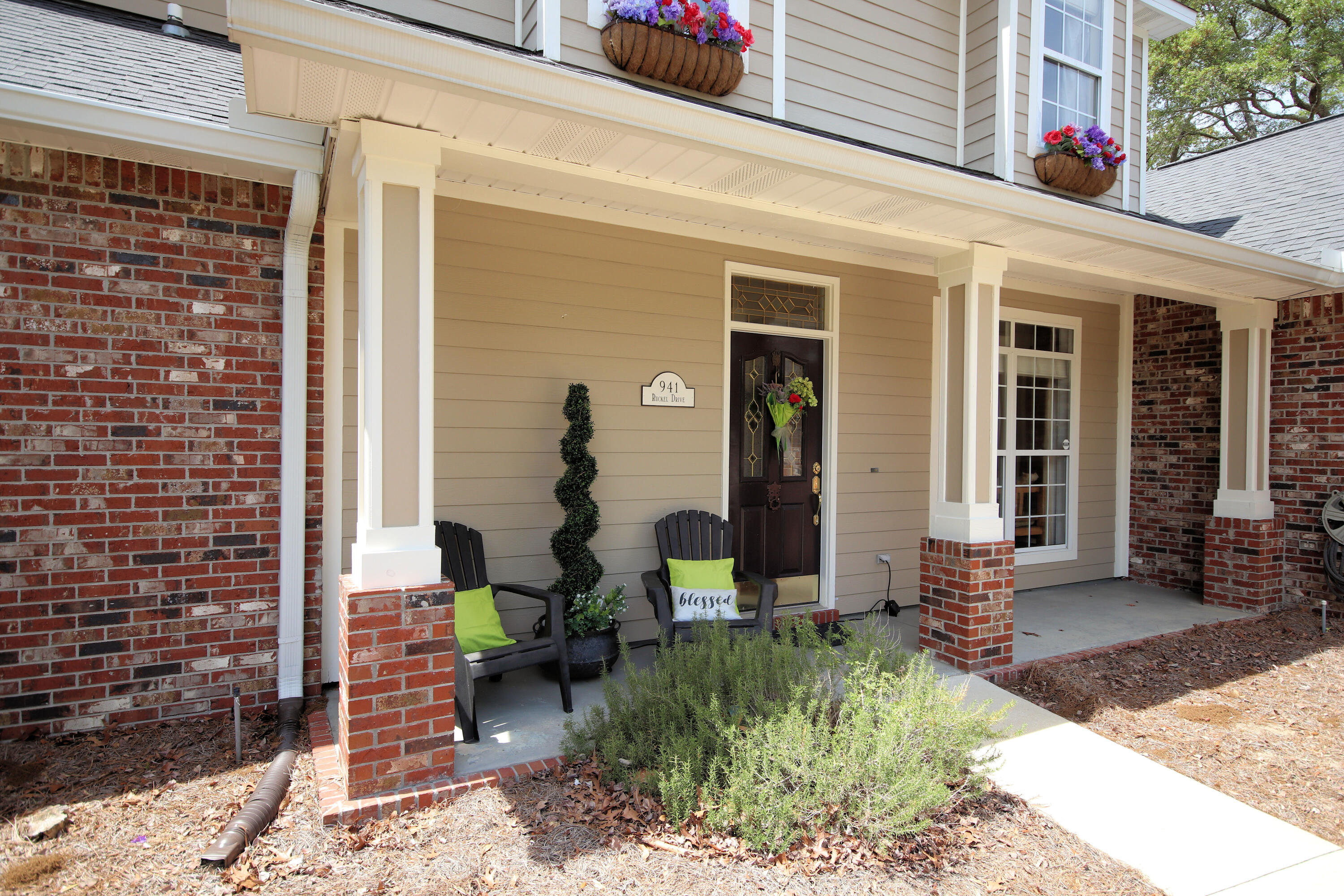 941 Ruckel Drive Niceville, FL 32578 - Photo 5 of 57 a front view of a house with outdoor seating