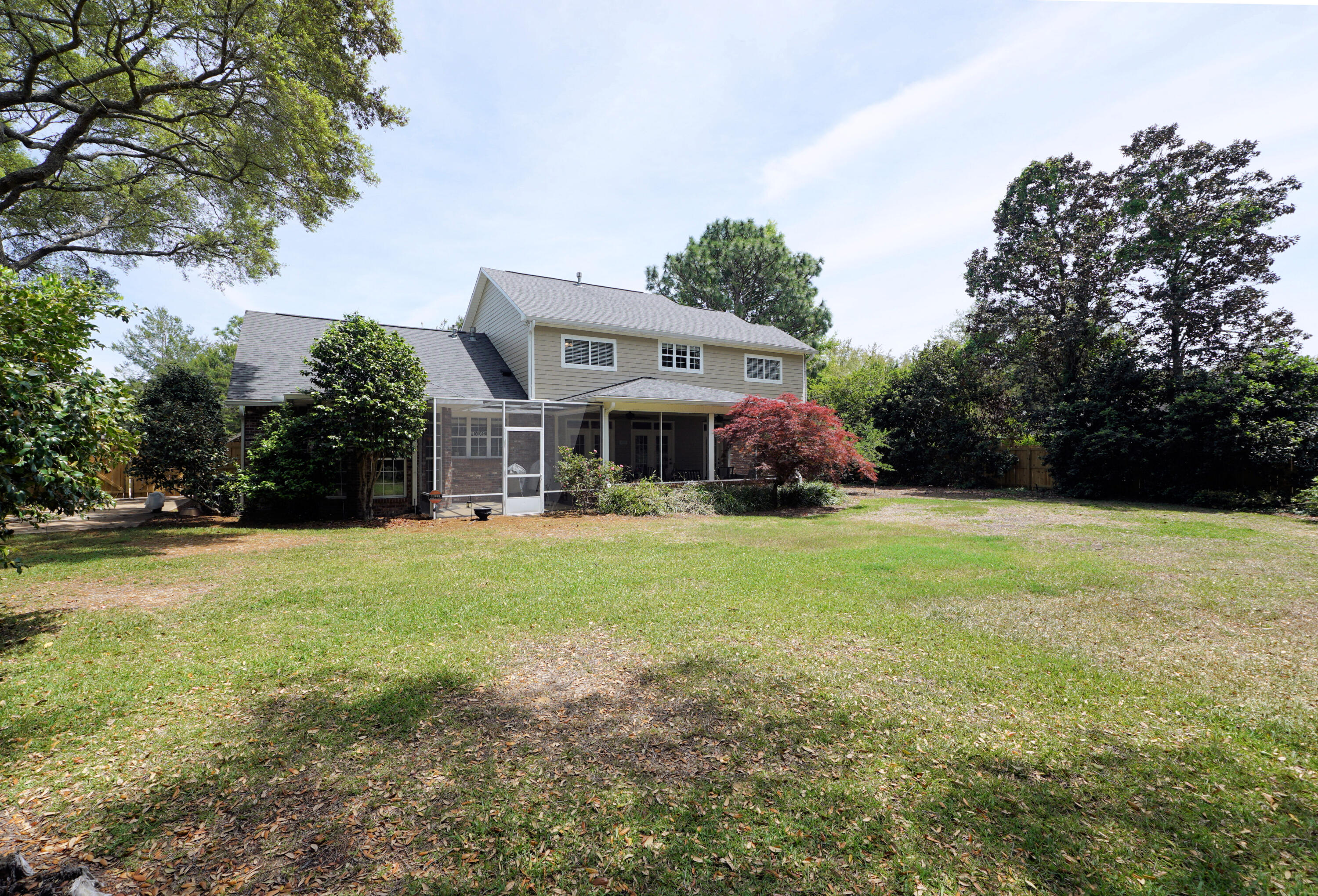 941 Ruckel Drive Niceville, FL 32578 - Photo 53 of 57 a front view of a house with garden
