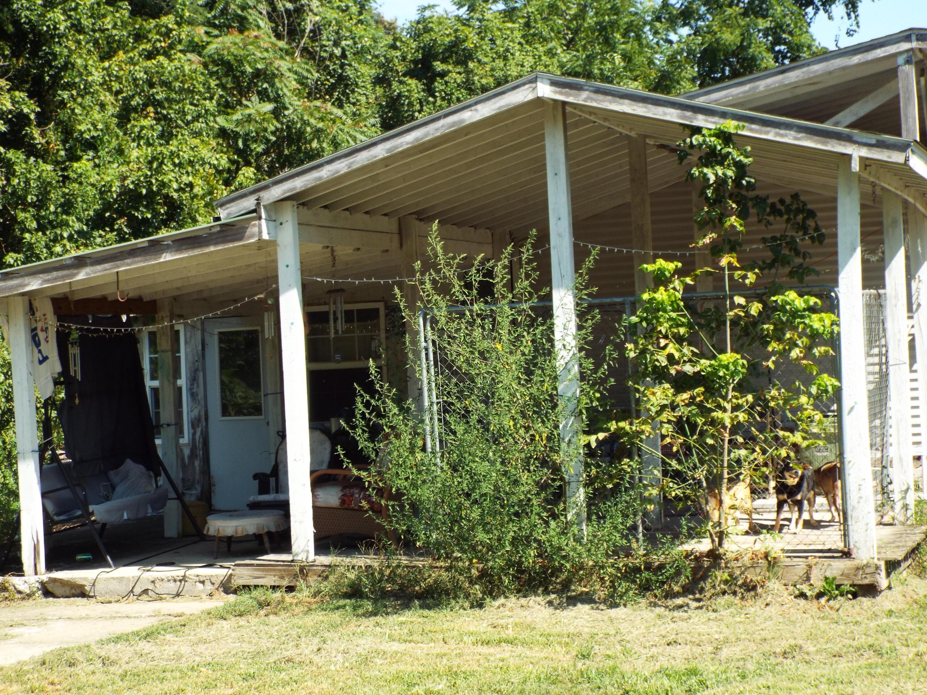 17687 Laurel Run Road Nelsonville, OH 45764 - Photo 4 of 20 Covered parking and storage adjacent to mobile home