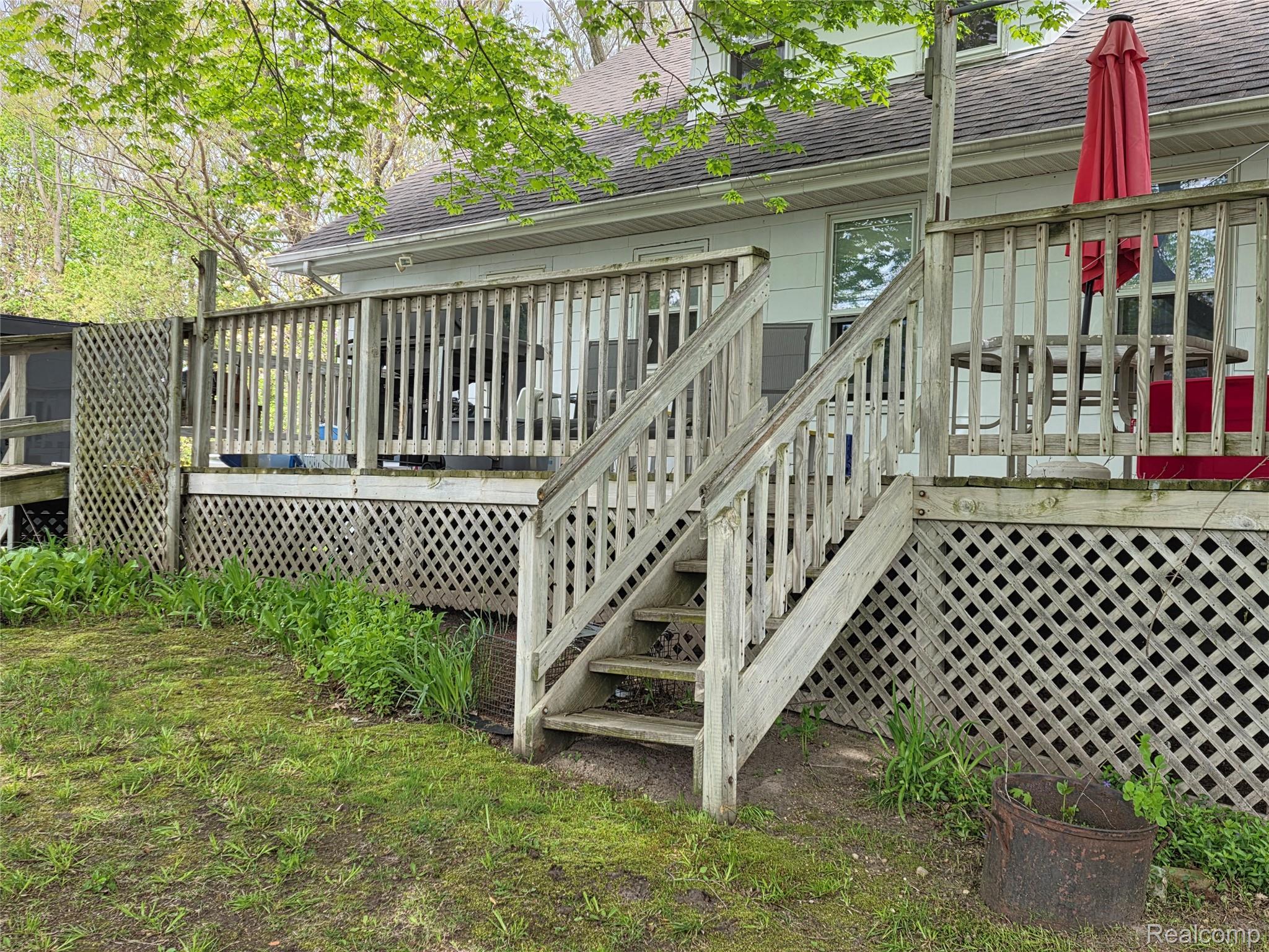 403 East Road Holly, MI 48442 - Photo 14 of 22 Wooden terrace featuring stairs