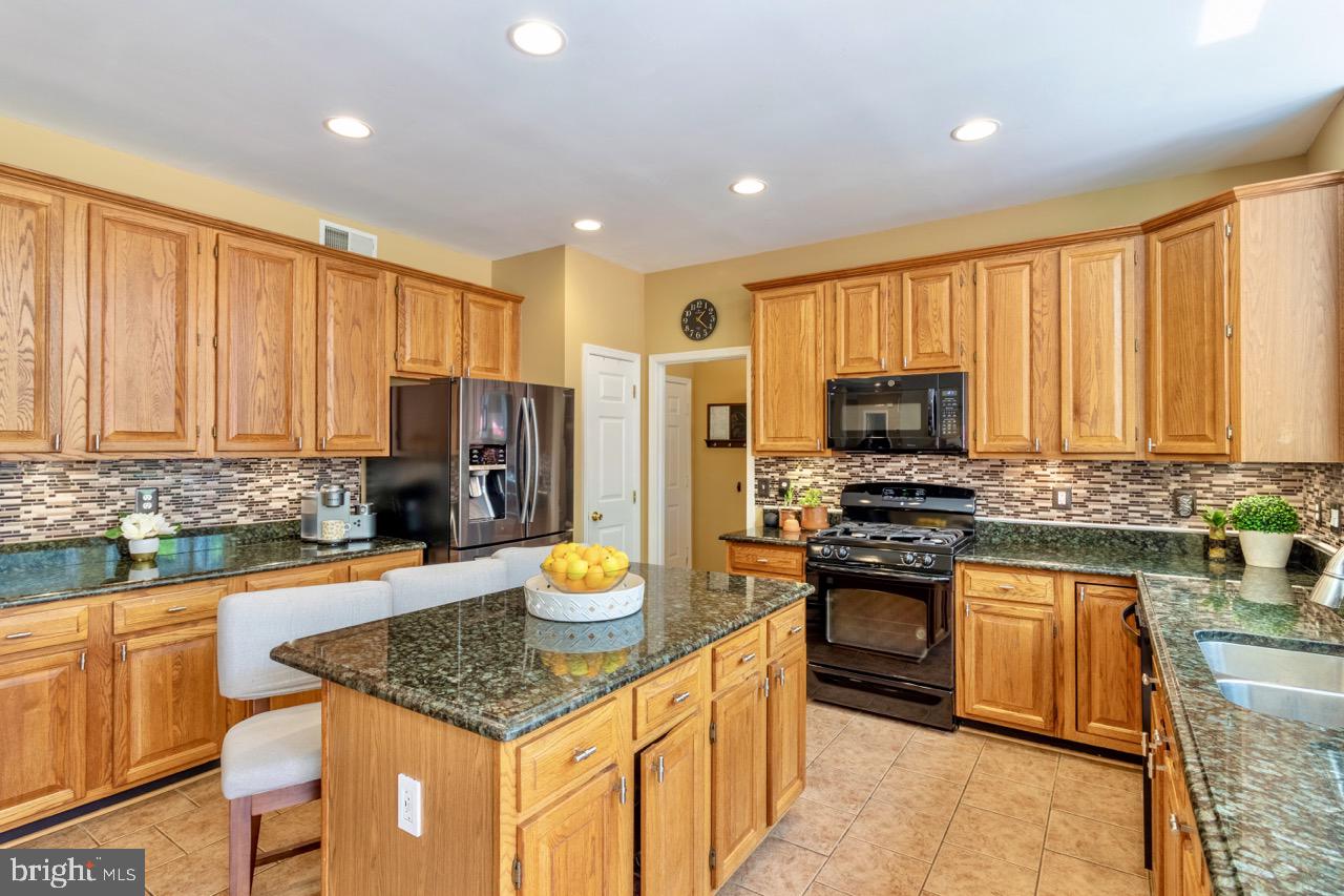 8901 Mountain Ash Drive Springfield, VA 22153 - Photo 7 of 49 Open Concept entertainer's kitchen