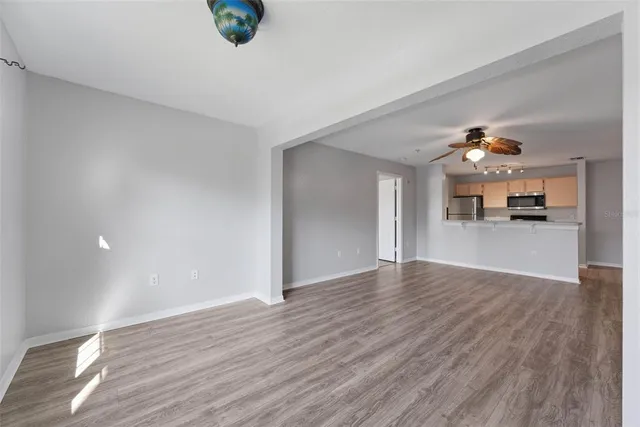 a view of a kitchen cabinets and wooden floor