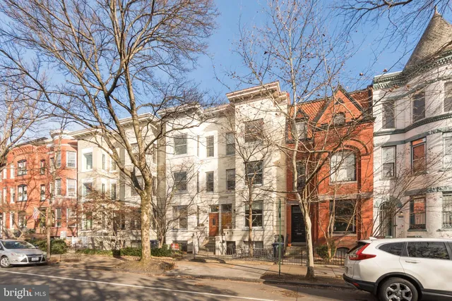 a view of a balcony with chairs