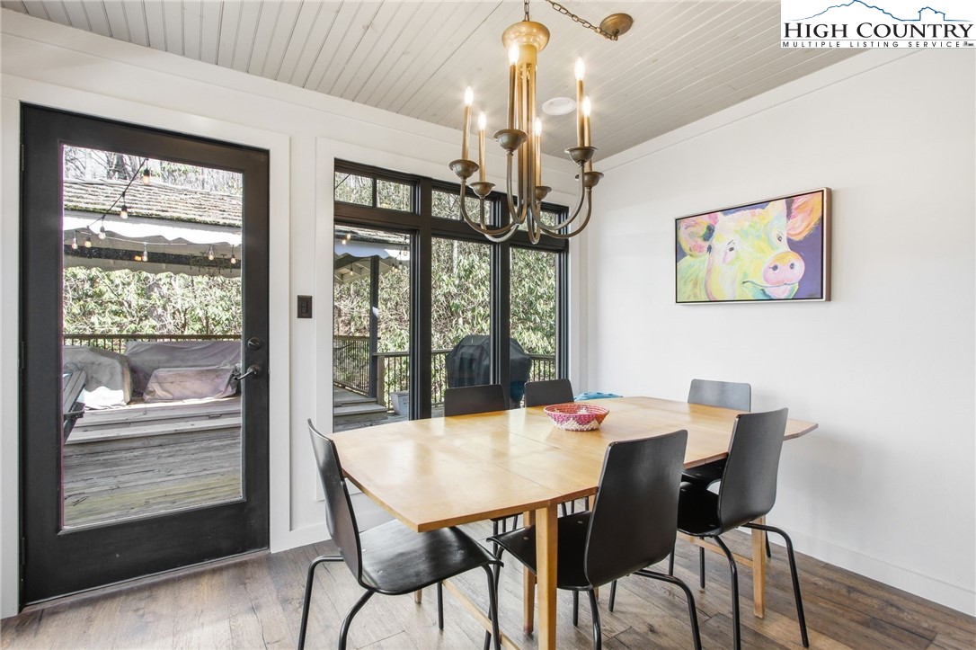 313 Birch Boone, NC 28607 - Photo 15 of 50 a view of a dining room with furniture window and wooden floor
