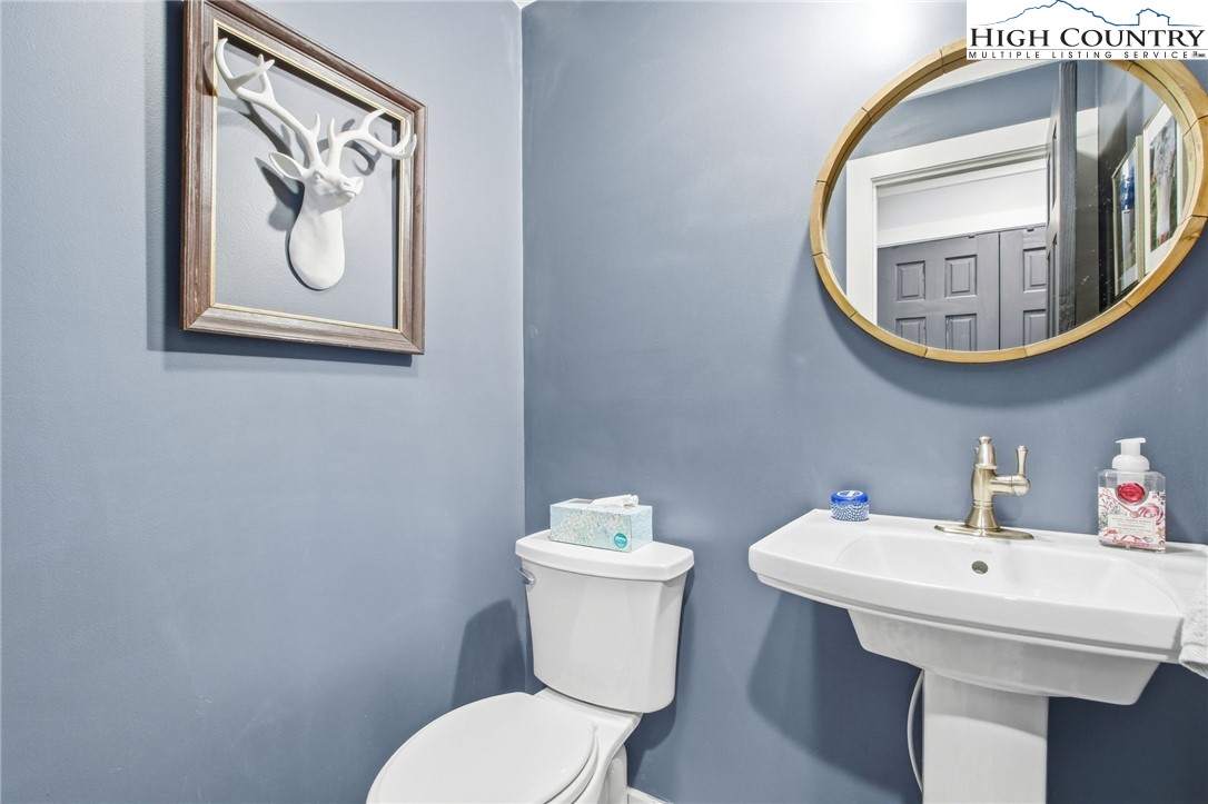 313 Birch Boone, NC 28607 - Photo 17 of 50 a bathroom with a toilet and sink