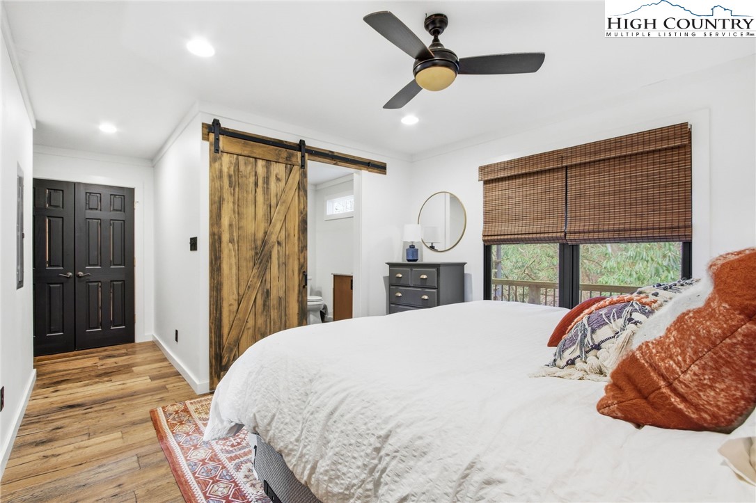 313 Birch Boone, NC 28607 - Photo 20 of 50 a bed sitting in a bedroom next to a window