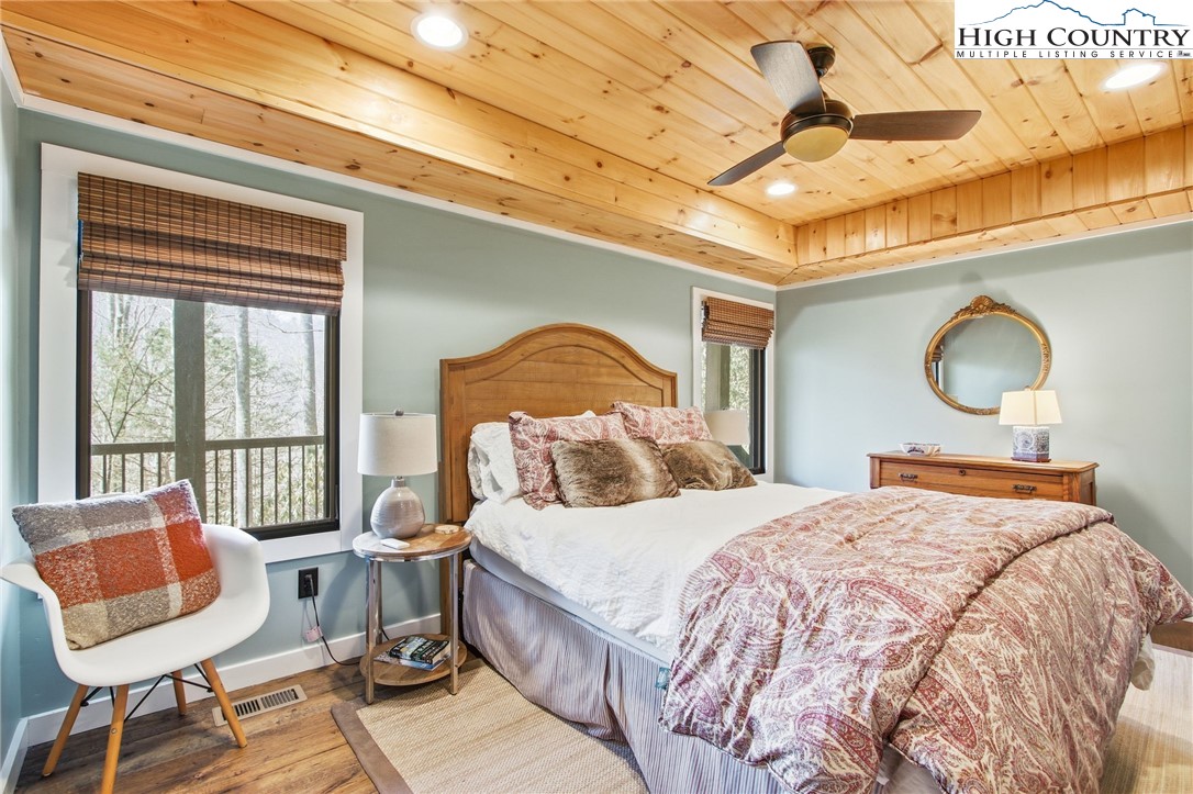 313 Birch Boone, NC 28607 - Photo 34 of 50 a bedroom with a bed and wooden floor