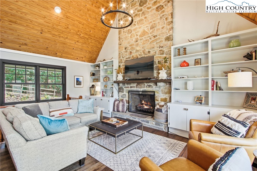 313 Birch Boone, NC 28607 - Photo 5 of 50 a living room with furniture fireplace and a flat screen tv