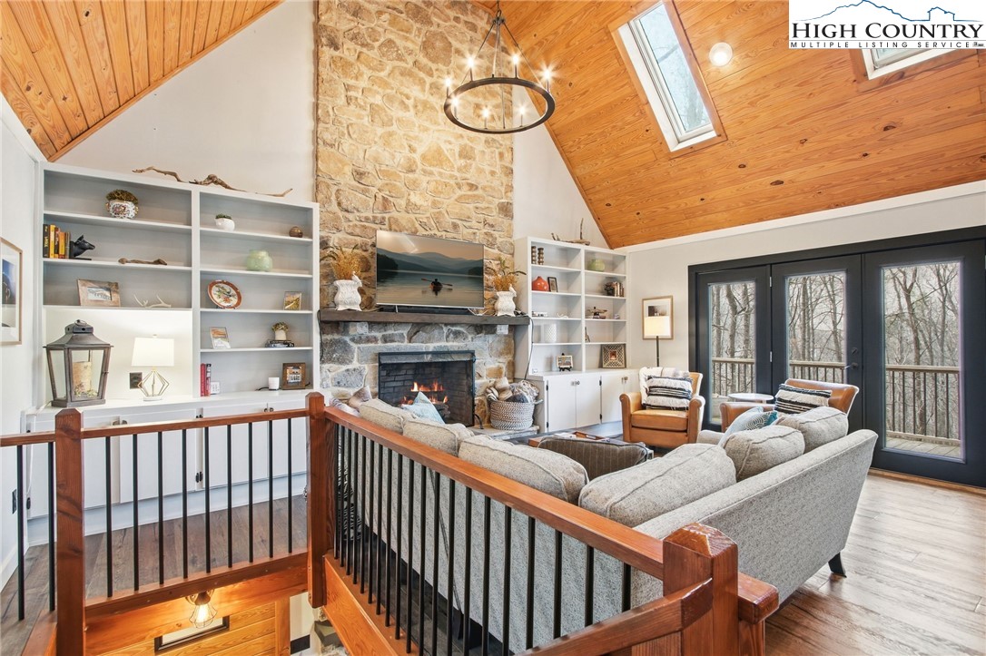 313 Birch Boone, NC 28607 - Photo 6 of 50 a living room with fireplace furniture and a large window