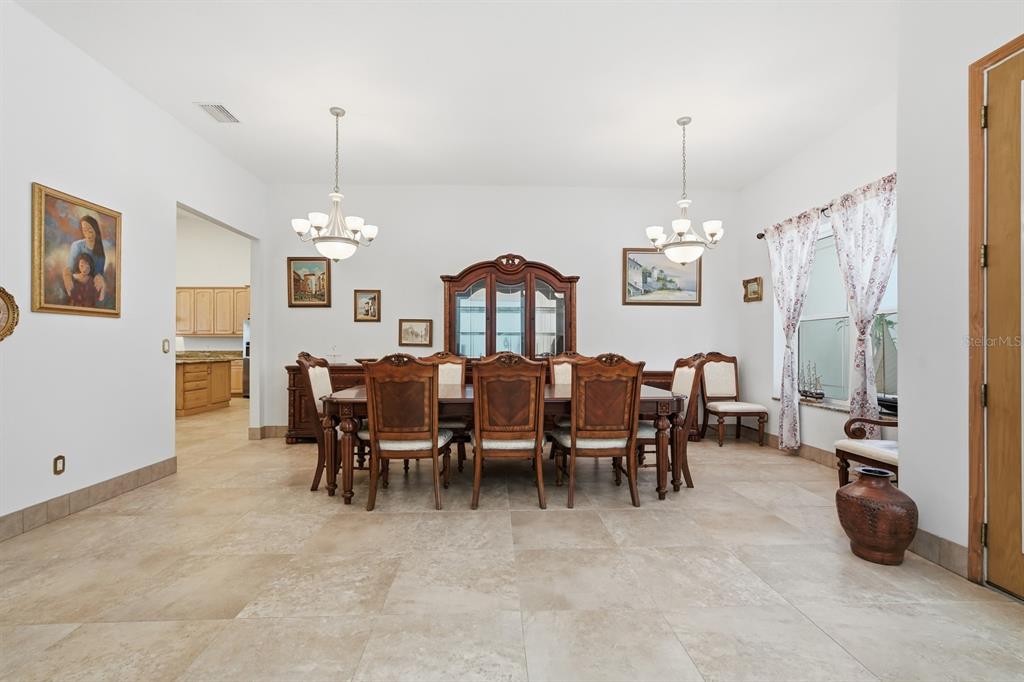105 Beach Street Ponce Inlet, FL 32127 - Photo 12 of 67 a view of a dining room and livingroom view