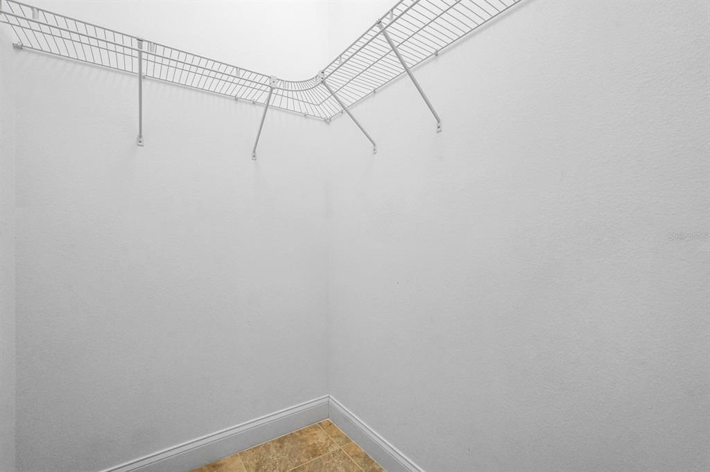 105 Beach Street Ponce Inlet, FL 32127 - Photo 43 of 67 a view of small space with racks on the wall