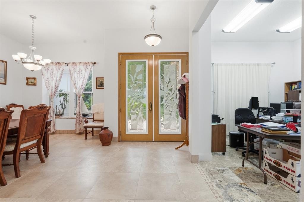 105 Beach Street Ponce Inlet, FL 32127 - Photo 8 of 67 a view of a livingroom with furniture and a window