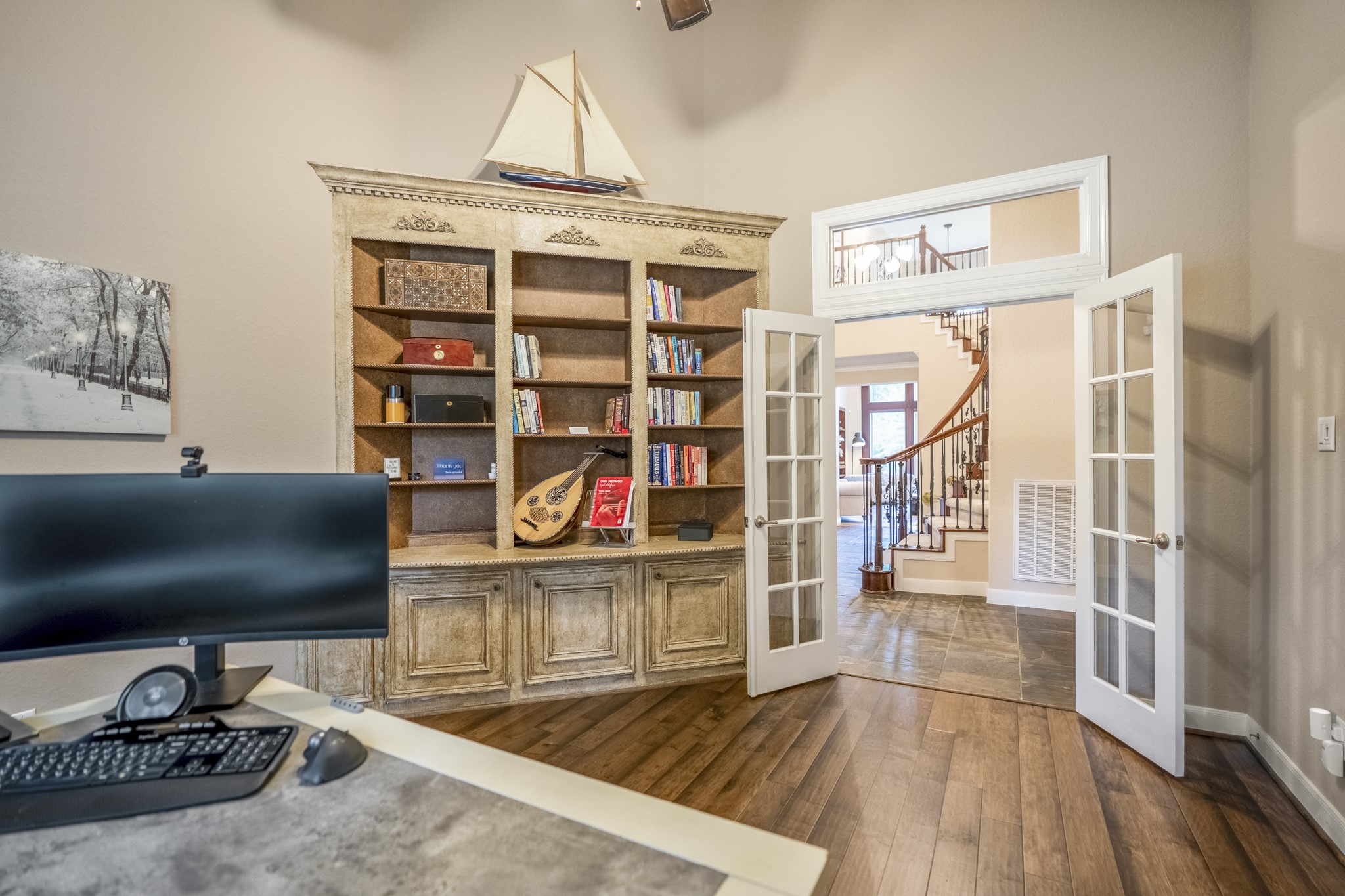 67 North Pentenwell Circle Spring, TX 77382 - Photo 8 of 50 a view of a workspace with furniture and wooden floor