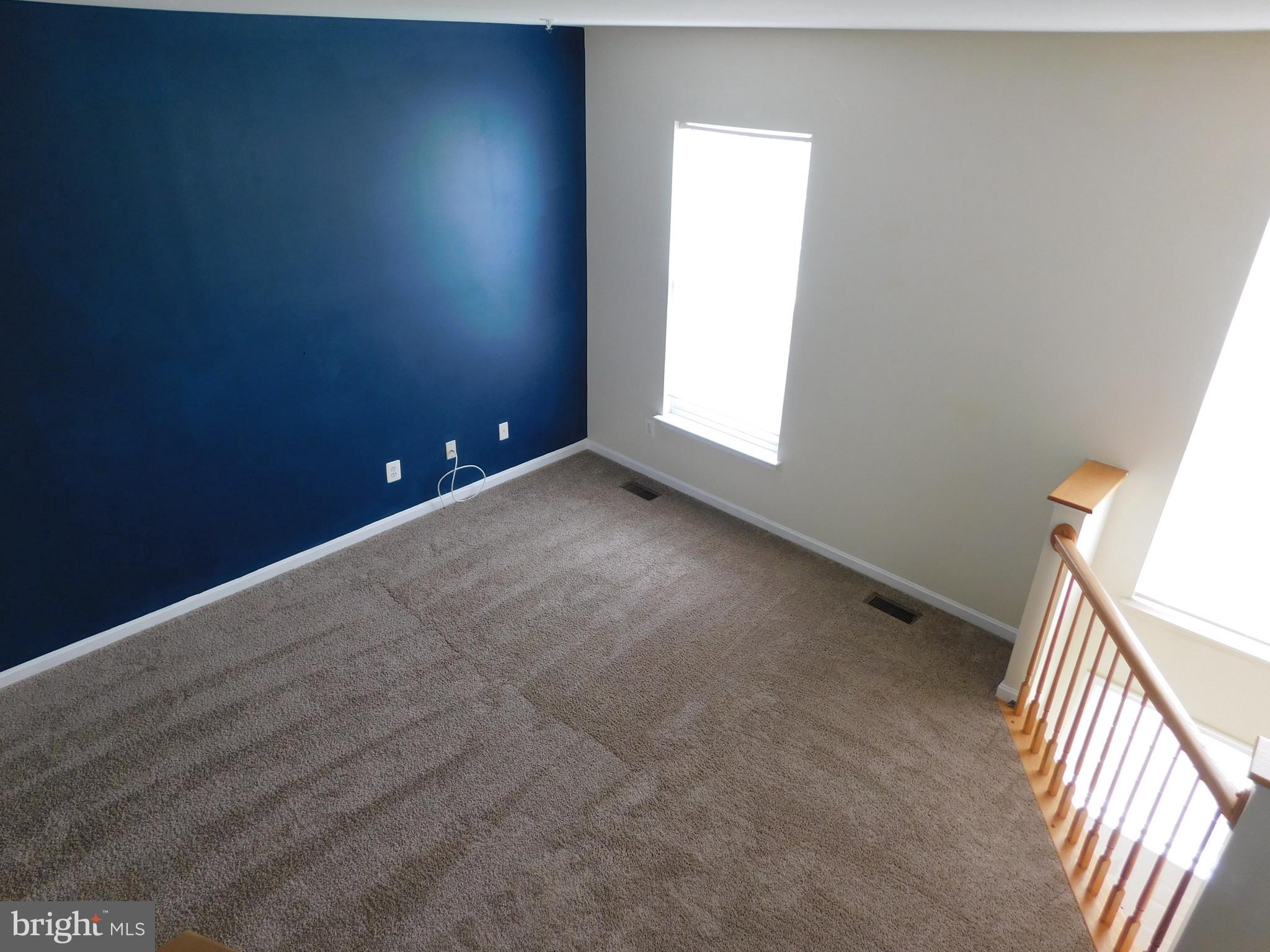 4036 Cutty Sark Road Baltimore, MD 21220 - Photo 8 of 25 a view of an empty room and a window