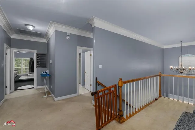 a view of a hallway with closet area