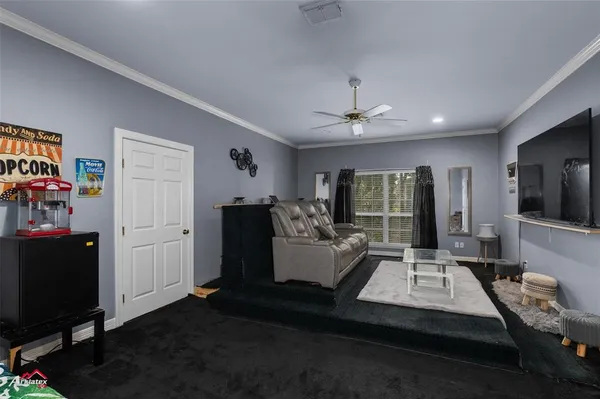 a room with furniture and a window