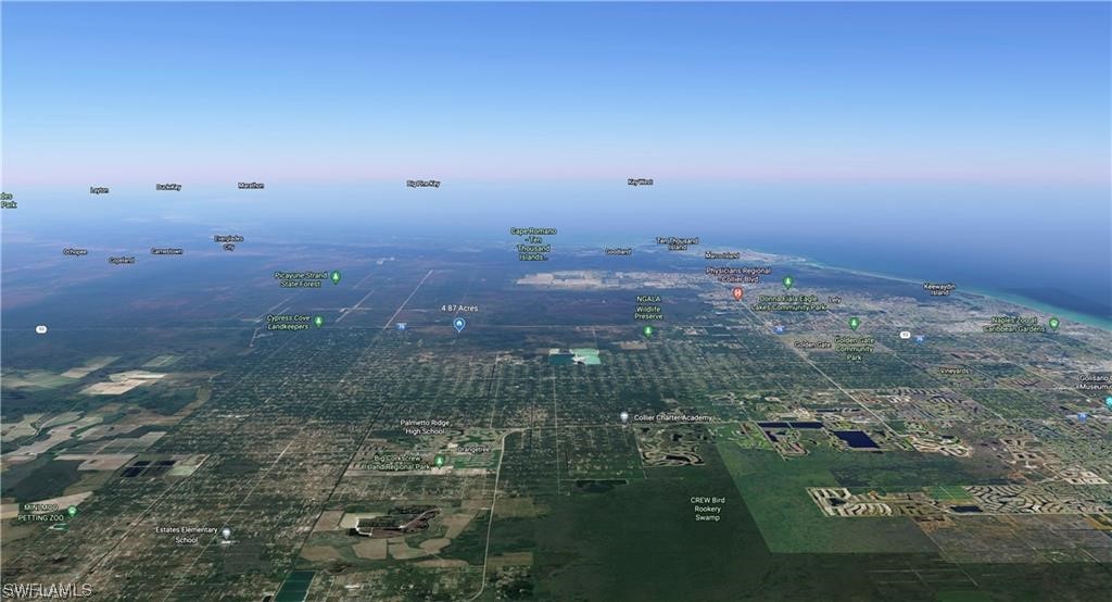 , No Street Naples, FL 34117 - Photo 4 of 8 an empty room with mountain view