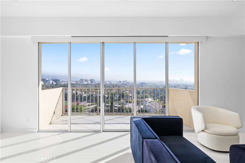 2160 Century Park East, Unit 902 Los Angeles, CA 90067 - Photo 11 of 51 a living room with furniture and a floor to ceiling window