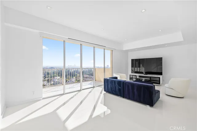 a bedroom with a bed and a shower