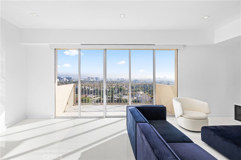 2160 Century Park East, Unit 902 Los Angeles, CA 90067 - Photo 4 of 51 a living room with furniture and a large window