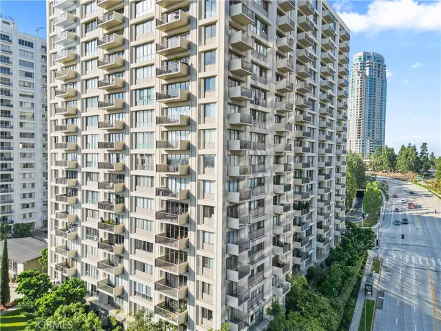 a view of a city with tall buildings