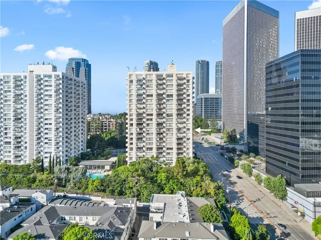 a view of a city with tall buildings