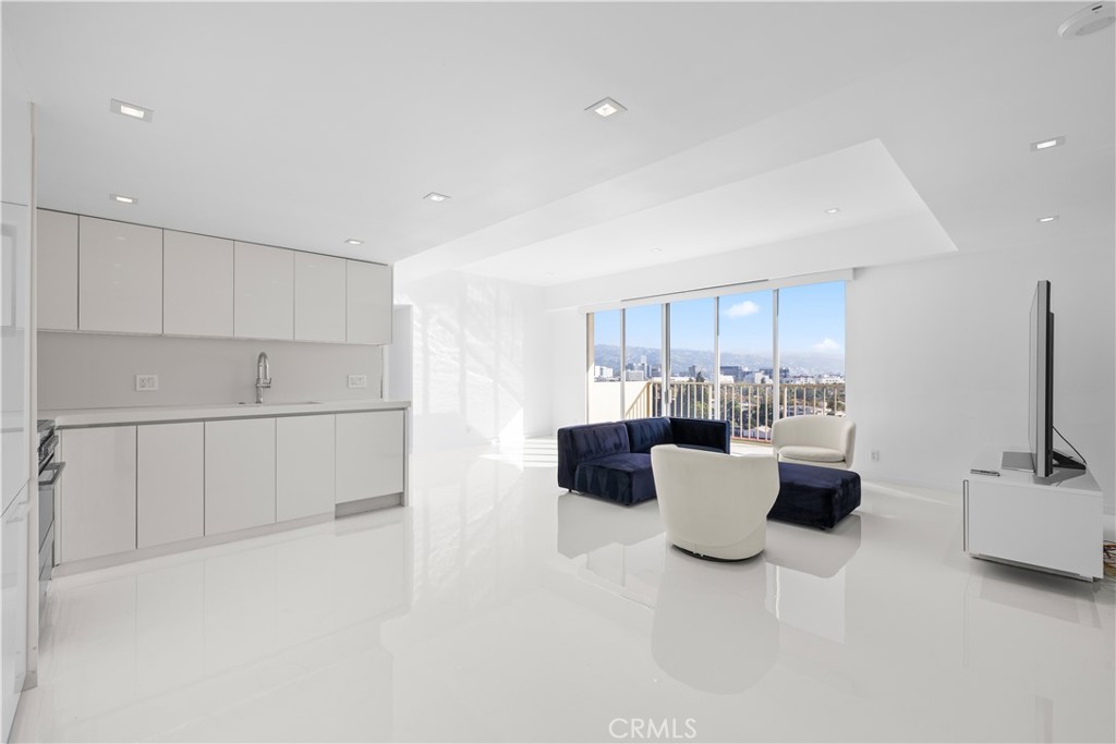 2160 Century Park East, Unit 902 Los Angeles, CA 90067 - Photo 5 of 51 a view of kitchen and living room