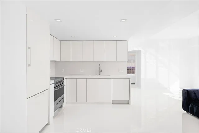 a view of a kitchen with electric appliances