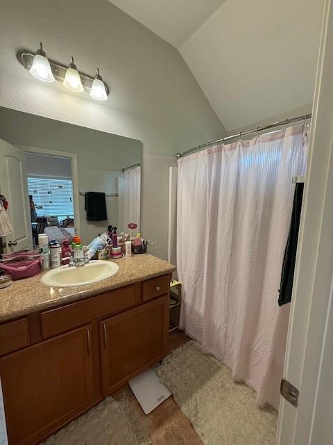 2513 South 2nd Street, Unit 3 Waco, TX 76706 - Photo 25 of 35 a bathroom with a double vanity sink and mirror