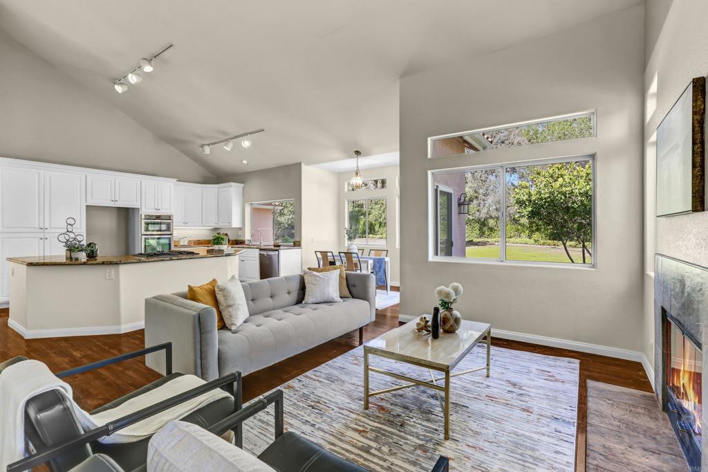 12236 Malabar Drive Poway, CA 92064 - Photo 11 of 32 a living room with furniture and a large window